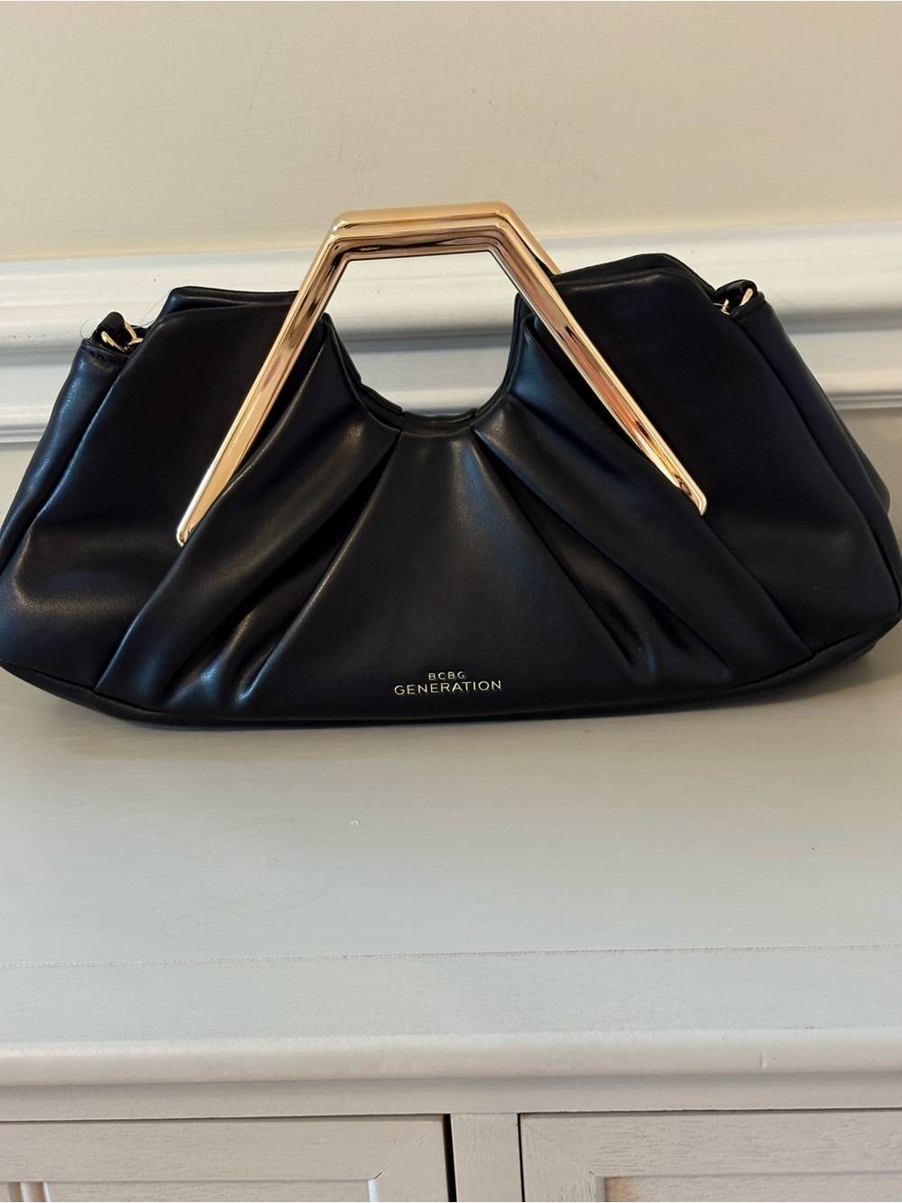 BCBGeneration Black Clutch with Gold Angular Top Handle